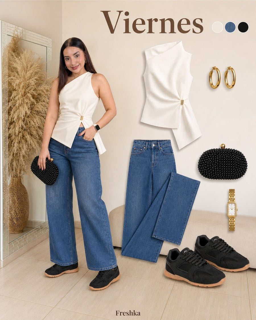 Look con tenis Mónaco Black: top blanco cruzado y jeans oscuros.
