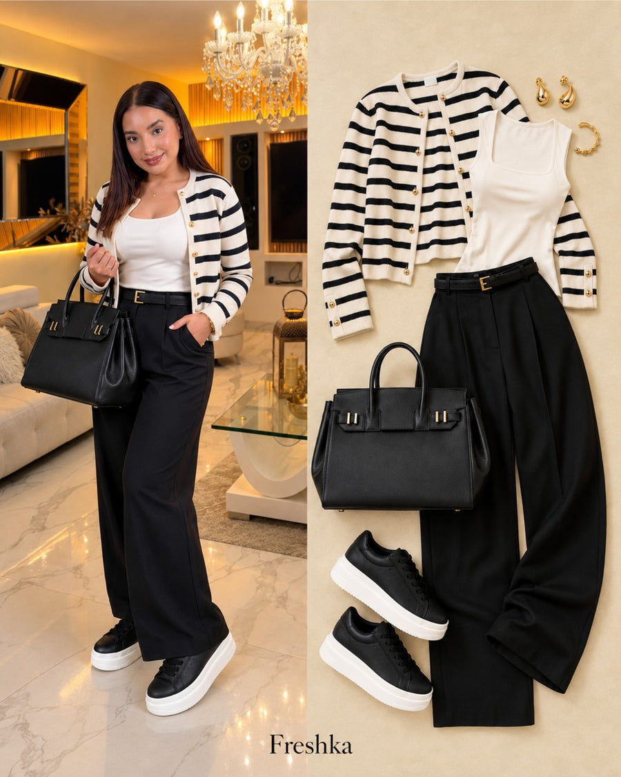 Look con tenis Oreo: cárdigan de rayas, top blanco y pantalón negro.