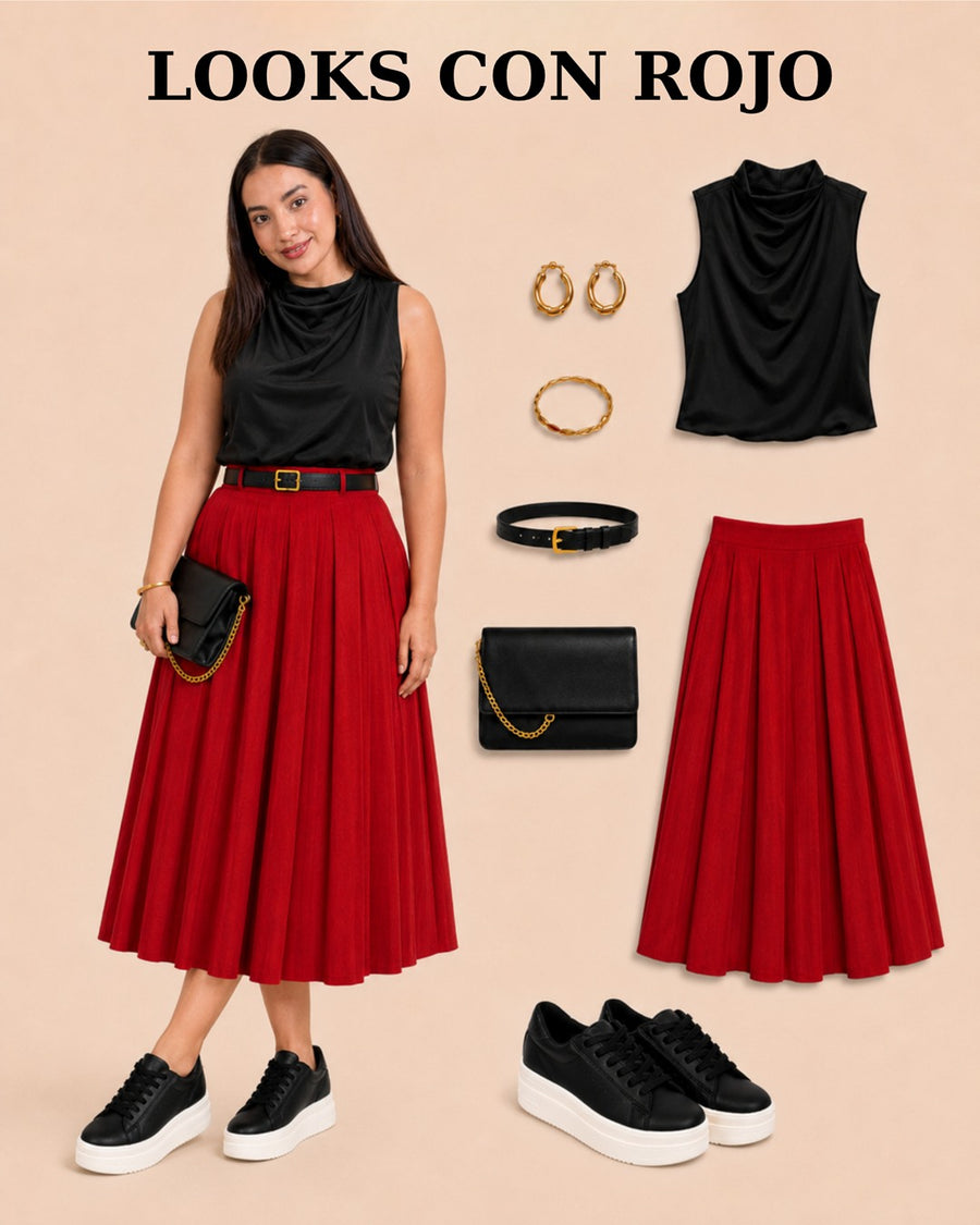 Look con tenis Oreo: top negro y falda roja plisada.