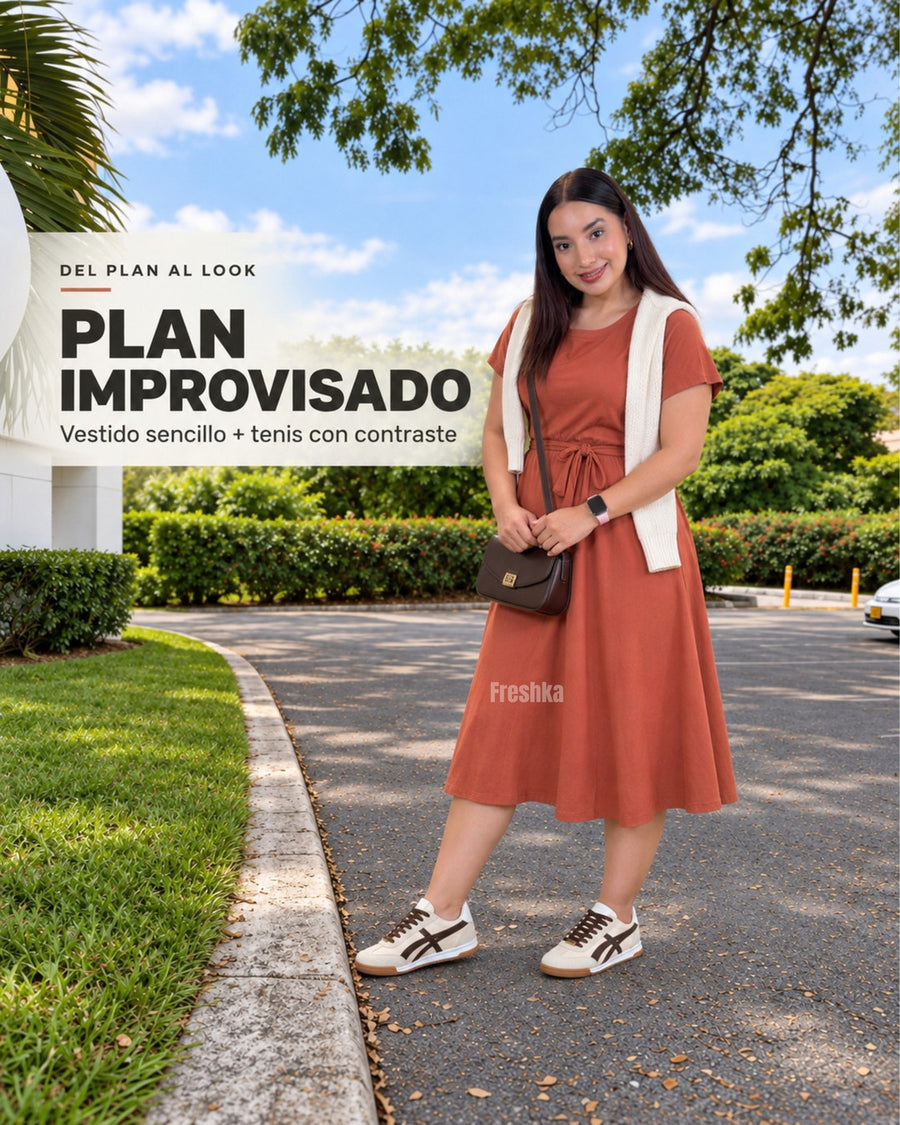 Look con vestido midi terracota y tenis Lux Chocolate para un paseo al aire libre.