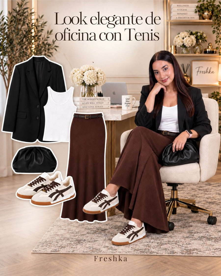 Look de oficina con tenis Lux Chocolate, blazer negro, top blanco y falda larga café.